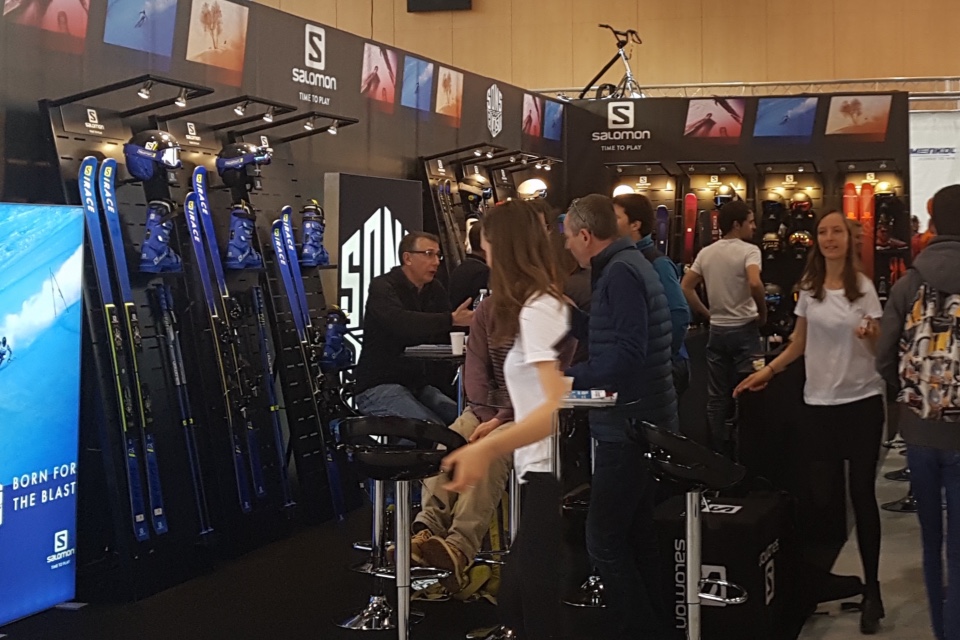 Amer Sports skis helmets and shoes displays