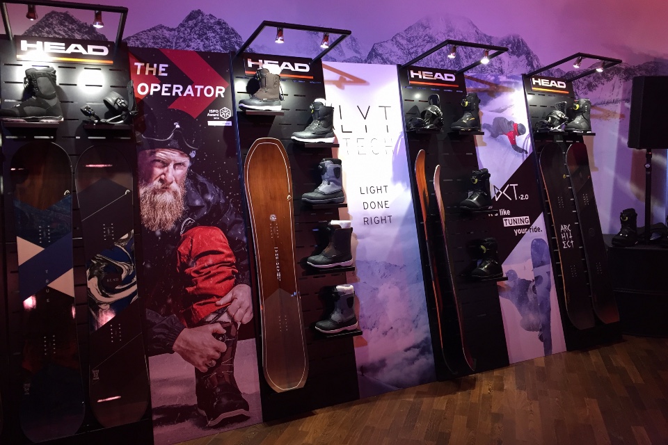 Head skis snowboard boots displays